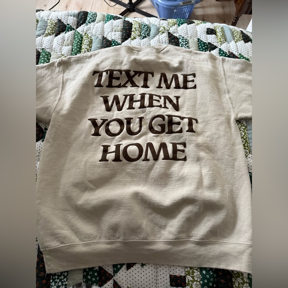 LONELY GHOST Cream Sweatshirt with Brown Text "TEXT ME WHEN YOU GET HOME"